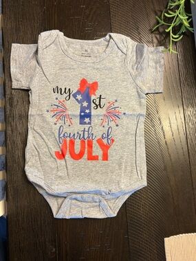 Heather gray short sleeve onesie. My first Fourth of July.